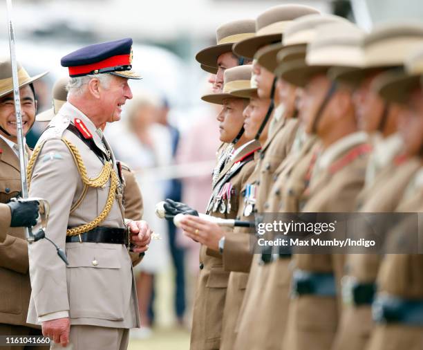 Prince Charles, Prince of Wales visits the Battalion during the 25th anniversary year of their formation to present operational medals for their...