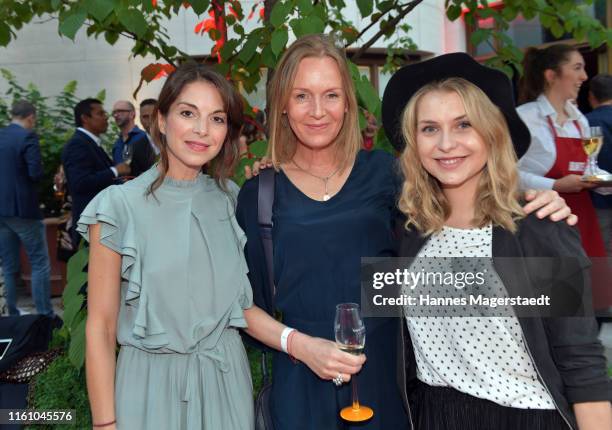 Bianca Hein, Carolin Fink and Sarah Thonig attend the Red Summer Night by Bunte.de at Rocco Forte The Charles Hotel on July 09, 2019 in Munich,...