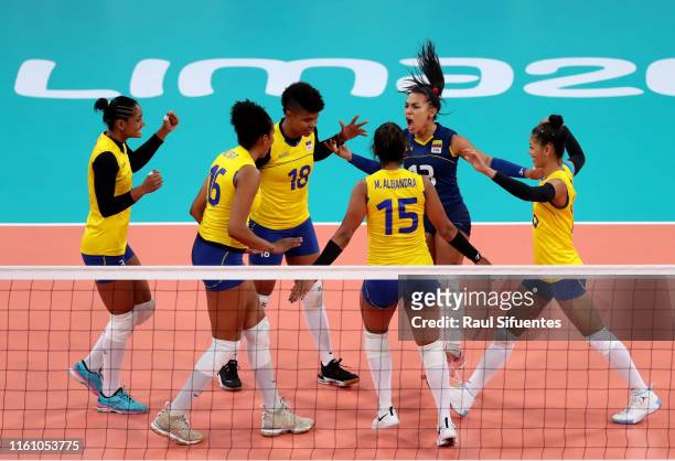 Players of Colombia celebrate during the women's volleyball final match between Colombia and Dominic Republic at Polideportivo Callao of Villa...
