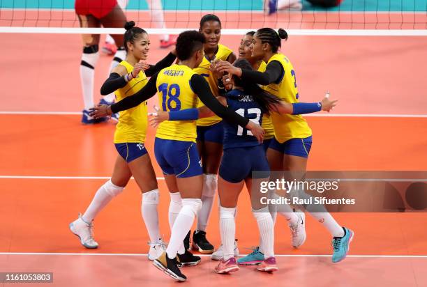 Players of Colombia celebrate a during the women's volleyball final match between Colombia and Dominic Republic at Polideportivo Callao of Villa...