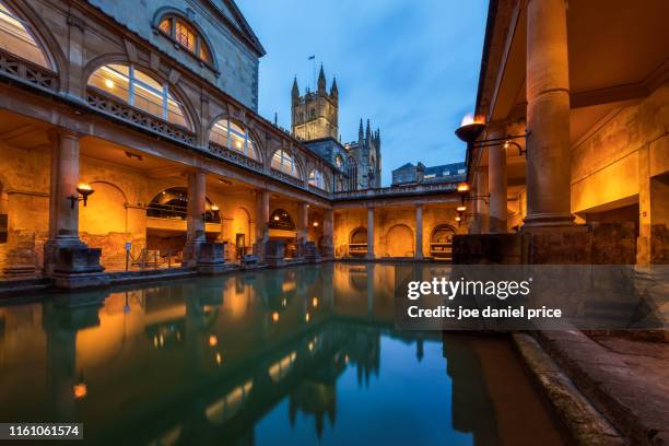 bath abbey from the roman baths, bath, somerset, england - roman bath england stock pictures, royalty-free photos & images