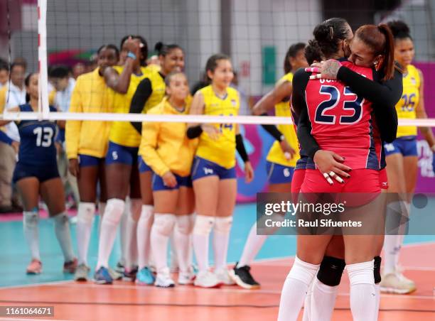 Players of Dominic Republic celebrate after winning the women's volleyball final match between Colombia and Dominic Republic at Polideportivo Callao...