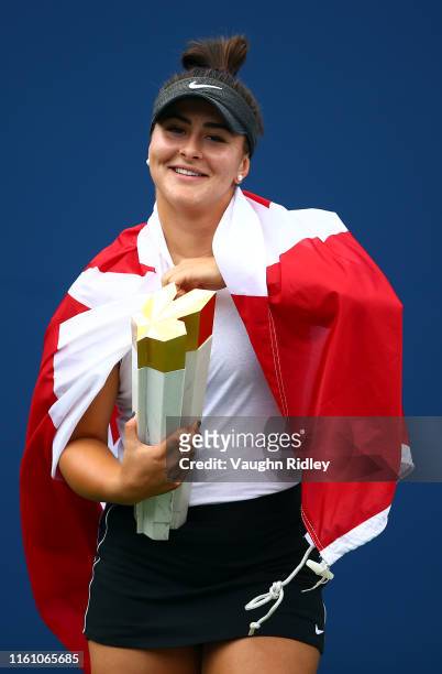 Bianca Andreescu of Canada with the winners trophy following her victory over Serena Williams of the United States in the final match on Day 9 of the...