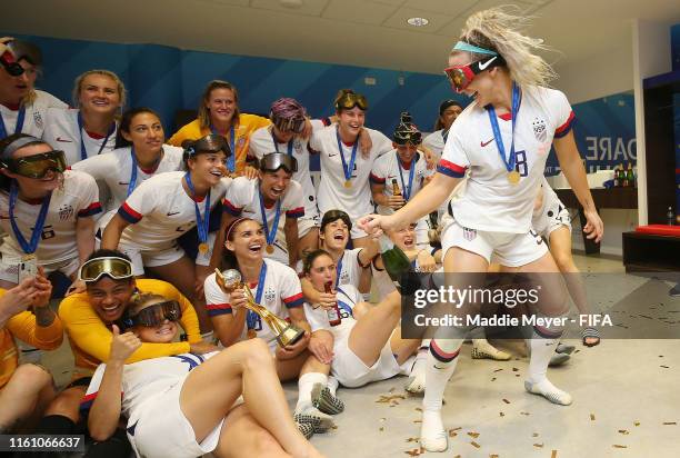 Julie Ertz of the USA dances in front of her teammates in the locker room after the 2019 FIFA Women's World Cup France Final match between The United...