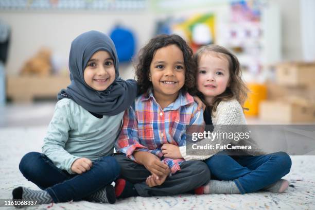kids posing together - preschool student stock pictures, royalty-free photos & images