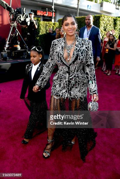 Blue Ivy Carter and Beyoncé attends the premiere of Disney's "The Lion King" at Dolby Theatre on July 09, 2019 in Hollywood, California.