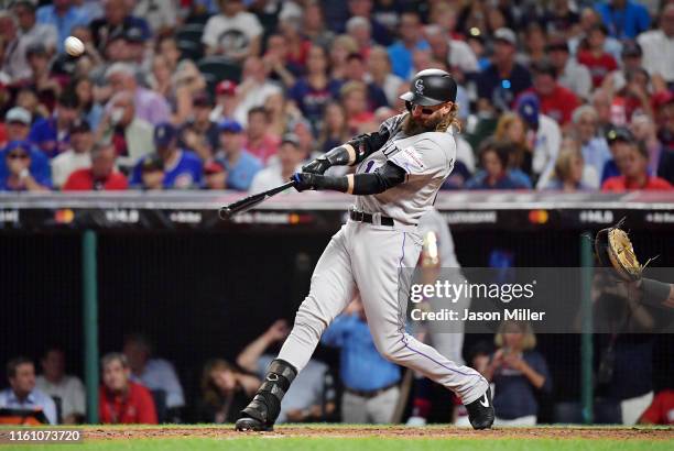 Charlie Blackmon of the Colorado Rockies and the National League hits a solo home run during the sixth inning against the American League during the...