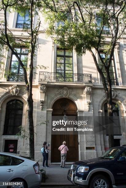 July 9]: MANDATORY CREDIT Bill Tompkins/Getty Images The townhouse where the financier Jeffrey Epstein is accused of engaging in sex acts with...