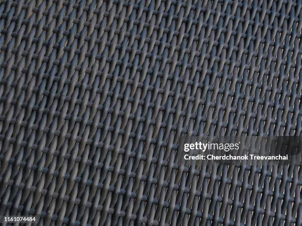 black plastic weaving background - wicker mat stock pictures, royalty-free photos & images