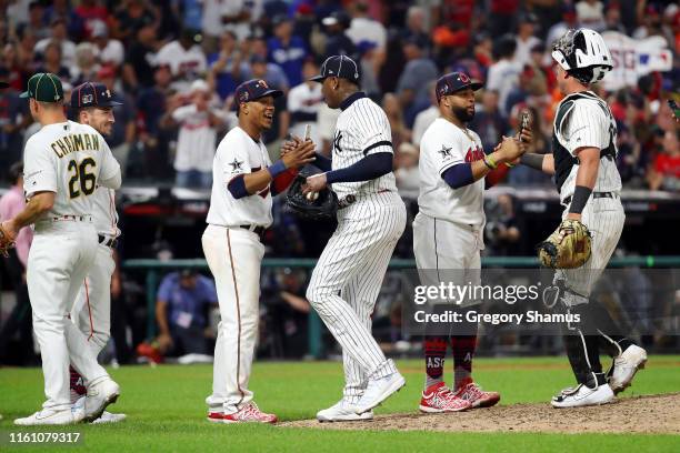 The American League All-Stars celebrate defeating the National League All-Stars 4-3 in the 2019 MLB All-Star Game, presented by Mastercard at...