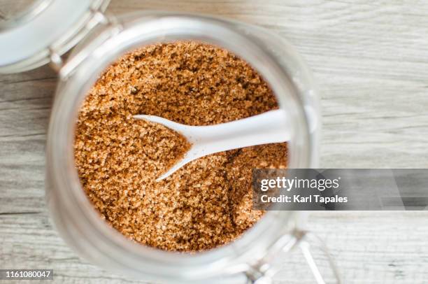 brown sugar in a glass jar - brown sugar stock pictures, royalty-free photos & images