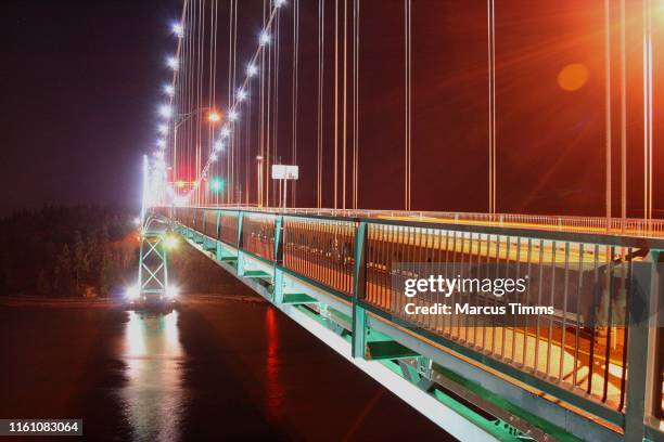 lions gate bridge by night - vancouver lions gate stock pictures, royalty-free photos & images