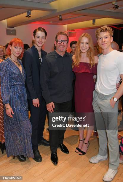 Sir Matthew Bourne poses with cast members Cordelia Braithwaite, Paris Fitzpatrick, Seren Williams and Andy Monaghan at the press night after party...