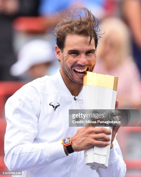 Rafael Nadal of Spain poses with the tournament trophy after his win against Daniil Medvedev of Russia during the mens singles final on day 10 of the...