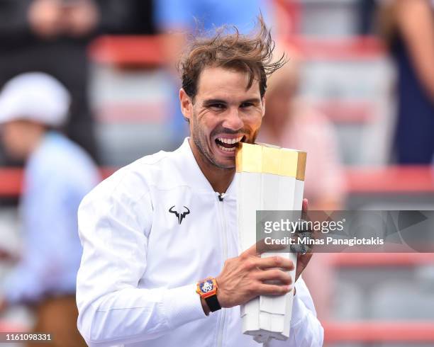 Rafael Nadal of Spain poses with the tournament trophy after his win against Daniil Medvedev of Russia during the mens singles final on day 10 of the...