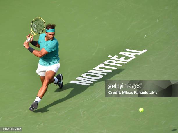 Rafael Nadal of Spain runs for the ball against Daniil Medvedev of Russia during the mens singles final on day 10 of the Rogers Cup at IGA Stadium on...