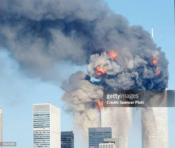 Fiery blasts rocks the World Trade Center after being hit by two planes September 11, 2001 in New York City.