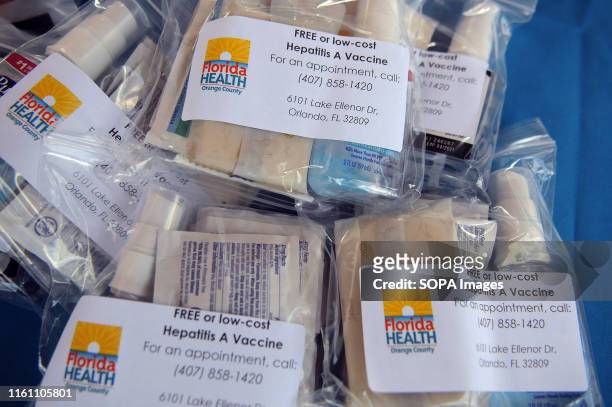 Hygiene kits are offered to attendees at a hepatitis A vaccination event sponsored by the Orange County, Florida Health Department in response to the...