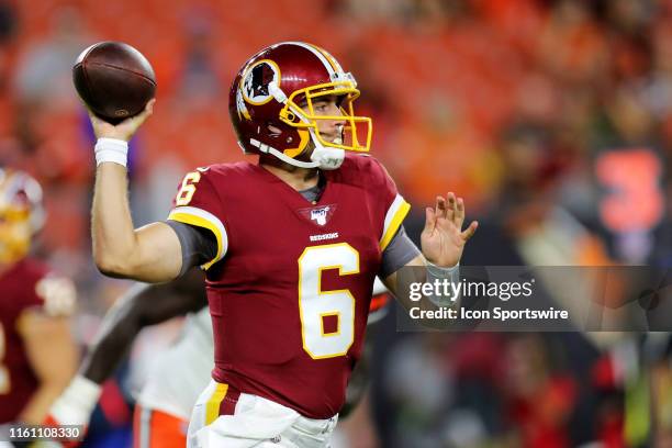Washington Redskins quarterback Josh Woodrum throws a pass during the fourth quarter of the National Football League preseason game between the...