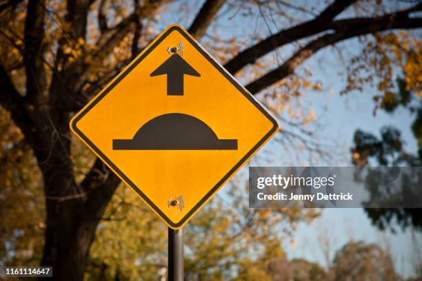 speed bump ahead - speed bump stock pictures, royalty-free photos & images