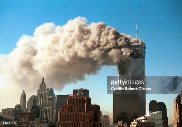 Smoke pours from the World Trade Center after it was hit by two hijacjked passenger planes September 11, 2001 in New York City in an alleged...