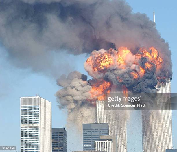 Fiery blasts rocks the World Trade Center after being hit by two planes September 11, 2001 in New York City.