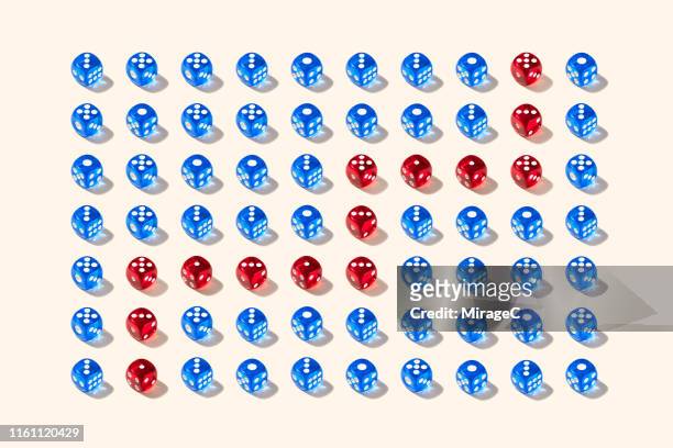 red routine of a blue dices maze - red dice stock pictures, royalty-free photos & images