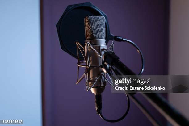 microphone in recording studio - podcast stock-fotos und bilder