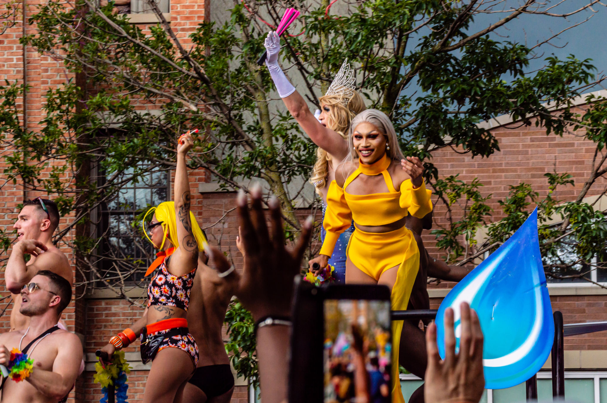 Crowds cheer for the Drag Queen performers at the Gay Pride parade. Crowds cheer for the Drag Queen performers at the Gay Pride parade.