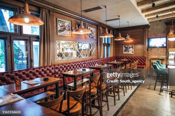 inside of empty pub - english pub stock pictures, royalty-free photos & images
