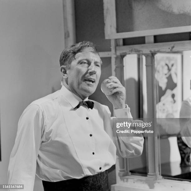 English actor Eric Barker pictured in character as Mr Lovegrove during filming of the episode 'The Ubiquitous Mr Lovegrove' from the ITC television...