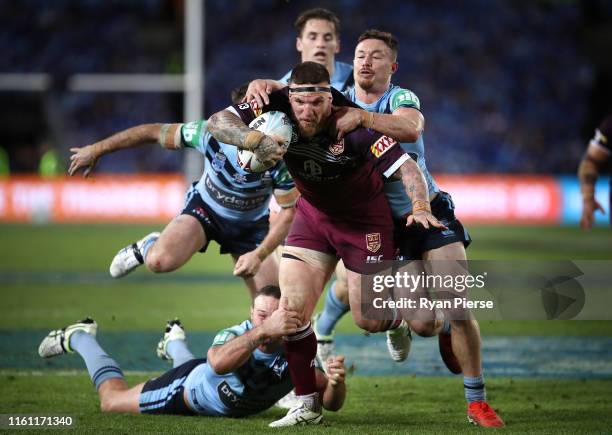 Josh McGuire of the Maroons makes a break to score a try during game three of the 2019 State of Origin series between the New South Wales Blues and...