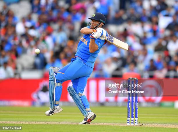 Dhoni of India in action batting during the Semi-Final match of the ICC Cricket World Cup 2019 between India and New Zealand at Old Trafford on July...
