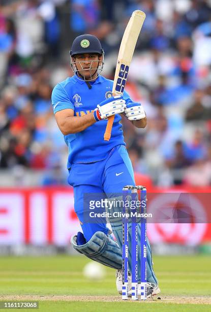 Dhoni of India in action batting during the Semi-Final match of the ICC Cricket World Cup 2019 between India and New Zealand at Old Trafford on July...