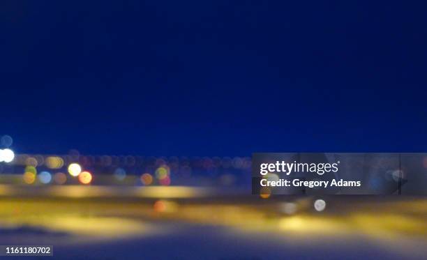 airport runway lights blurred by motion - runway night stock pictures, royalty-free photos & images