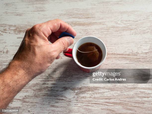 3,134 Male Making Tea Stock Photos, High-Res Pictures, and Images ...