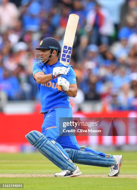 Dhoni of India bats during resumption of the Semi-Final match of the ICC Cricket World Cup 2019 between India and New Zealand after weather affected...