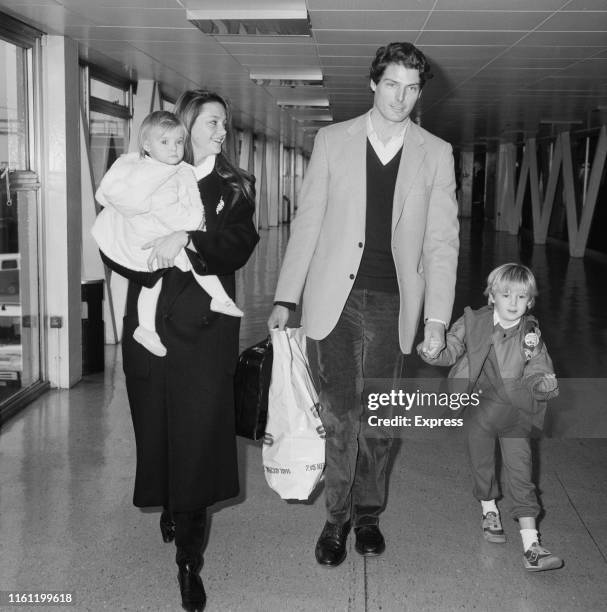 American actor Christopher Reeve with his partner Gae Exton and their children Matthew Reeve and Alexandra Reeve Givens at Heathrow Airport, London,...