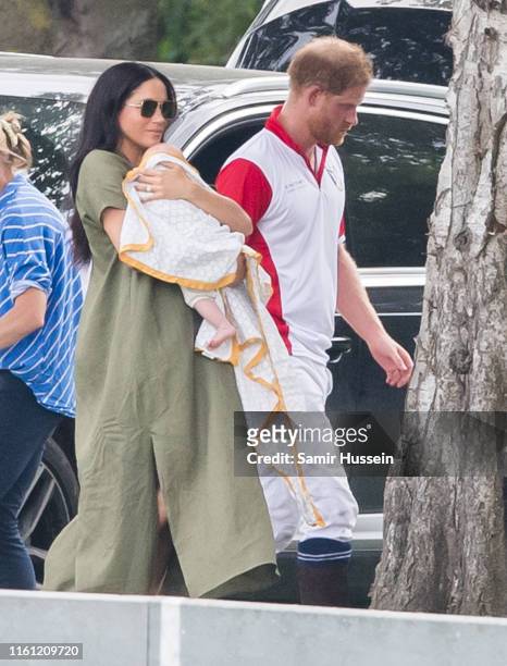 Meghan, Duchess of Sussex, Archie Harrison Mountbatten-Windsor and Prince Harry, Duke of Sussex attend The King Power Royal Charity Polo Day at...