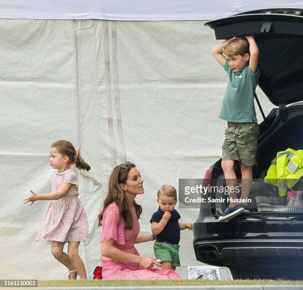 Catherine, Duchess of Cambridge, Prince Louis, Prince George and Princess Charlotte attend The King Power Royal Charity Polo Day at Billingbear Polo...
