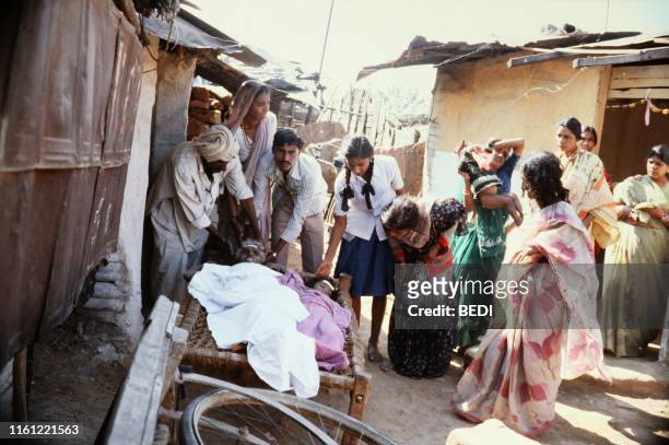 Victims of the Bhopal tragedy wait to be treated on December 04, 1984 at Bhopal's hospital where a poison gas leak from the Union Carbide factory...