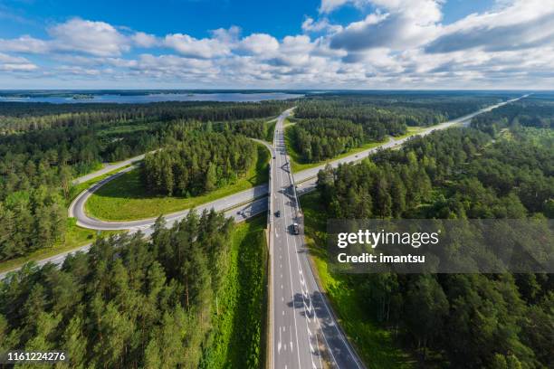 straße in lettland - lettland landschaft stock-fotos und bilder
