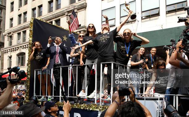 United States Soccer Federation president Carlos Cordeiro,Megan Rapinoe, Alex Morgan and Allie Long celebrate U.S. Women's National Soccer Team...