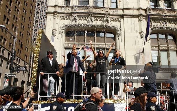 United States Soccer Federation president Carlos Cordeiro, Alex Morgan and Allie Long celebrate U.S. Women's National Soccer Team Victory during a...