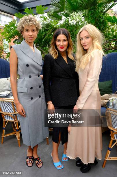Phoebe Collings-James, Camilla Freeman Topper and Clara Paget attend as CAMILLA AND MARC celebrate their launch into Selfridges London with a dinner...