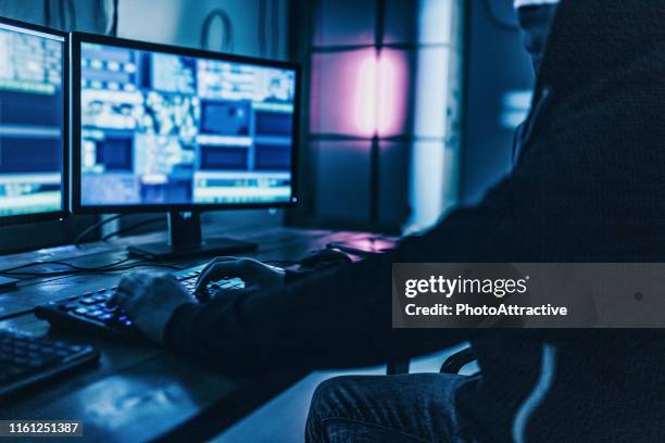 hacker stealing informations - broadcast control room stock pictures, royalty-free photos & images