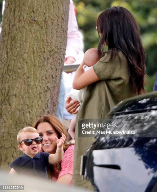 Prince Louis of Cambridge, Catherine, Duchess of Cambridge, Meghan, Duchess of Sussex and Archie Harrison Mountbatten-Windsor attend the King Power...