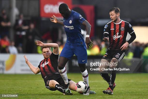 Tiemoue Bakayoko of Chelsea is challenged by Scott Allardice of Bohrmians and Conor Levingston of Bohemians during the Pre-Season Friendly match...