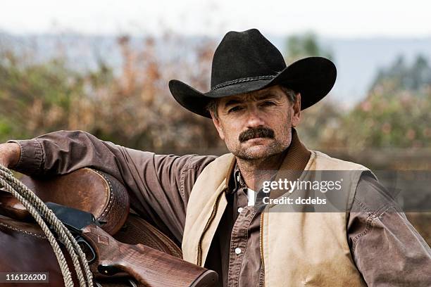 cowboy - cowboy hat stock pictures, royalty-free photos & images