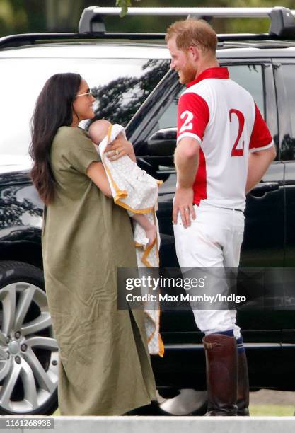 Meghan, Duchess of Sussex, Archie Harrison Mountbatten-Windsor and Prince Harry, Duke of Sussex attend the King Power Royal Charity Polo Match, in...